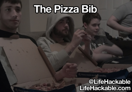 Image: Some people eating pizza out of boxes, with the boxes arranged with the lid acting as a bib. Image text: The pizza bib.